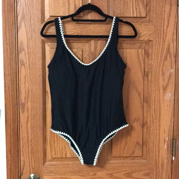 black one piece with white trim